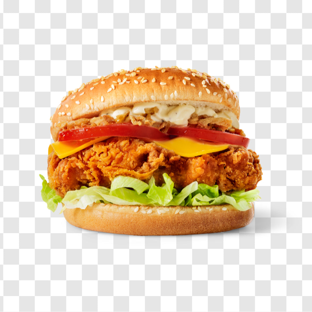 Pouring sesame seeds on crispy chicken burger